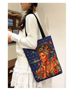 Large capacity canvas shoulder tote bag featuring an African American art print and Freedom text.