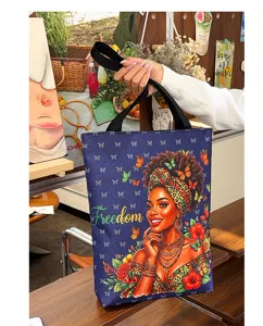 Canvas tote bag with artistic black woman print, large capacity shoulder bag for daily use.