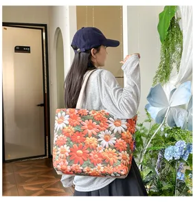 Bolso bandolera de lona casual con bordado floral vibrante y gran capacidad de uso