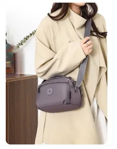 Casual solid color nylon crossbody shoulder bag for women, lightweight and durable everyday purse.
