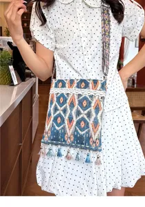 Bolso cruzado estilo étnico con patrón geométrico tejido, bolso vintage con borlas.