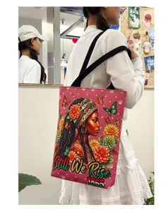 Grand sac cabas en toile de grande capacite avec imprime floral beaute noire bandouliere