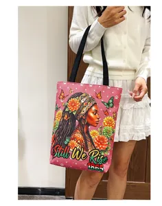 Grand sac cabas en toile avec imprime femme noire et fleurs sac a epaule casual.