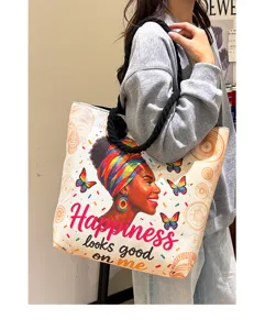 Canvas shopper tas detail met etnische vrouwen print en dikke touw handvatten voor dagelijks.
