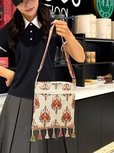 Bolso cruzado de estilo étnico con patrón Atlas, correa tejida y borlas gran capacidad.