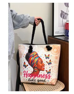 Canvas shopper tas met kleurrijke etnische kunstprint en dikke touw handvatten.