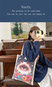 Stilvolle Segeltuchtasche mit niedlichem Katzen-Druck, ideal für den täglichen Einkauf.