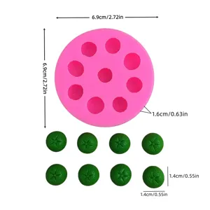 Pink silicone citrus fruit mold with detailed dimensions for baking and cake decorating.
