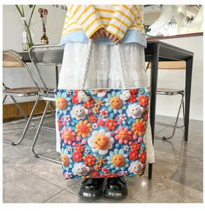 Fashionable casual canvas tote bag featuring colorful smiley flower print and thick rope handles.