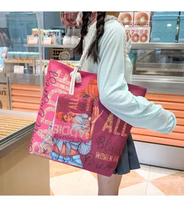 Sac cabas en toile avec imprimé fille noire, sac à main tendance pour le shopping et voyage.