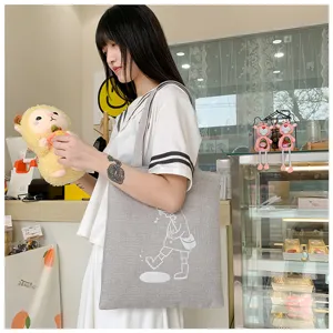 Borsa tote in tela di lino grigia con stampa di simpatici cartoni animati, casual ed elegante.