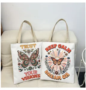 Detalle bolsa tote lona, estampado mariposa retro, bolso hombro casual de gran capacidad.