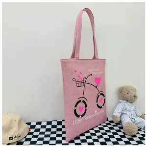 Borsa tote in tela rosa vista dettagliata, grazioso design con bici, borsa casual chic.