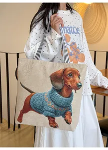 Canvas tote bag featuring cute dachshund dog embroidery, large capacity shoulder shopping bag detail view.