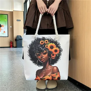 Canvas tote bag detail showcasing African woman art print and sturdy rope handles for beach.