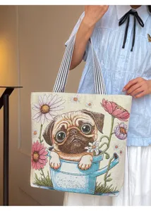 Close-up detail of the canvas tote bag featuring cute pug and floral woven pattern.