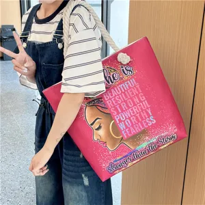 Large canvas shoulder bag featuring African woman illustration and inspirational quotes for beach.