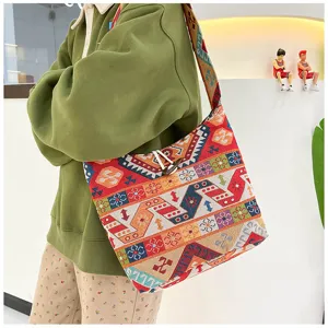 Ethnic style woven shoulder bag for women, colorful geometric pattern casual tote bag.