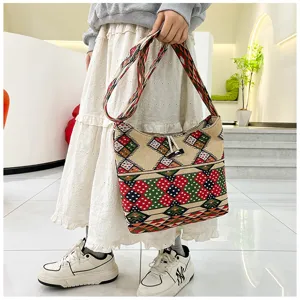 Ethnic style embroidered shoulder bag with geometric pattern and horn button for casual daily wear
