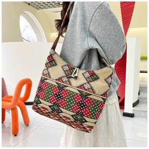 Bohemian ethnic embroidered canvas shoulder bag casual large crossbody bag for women daily use.