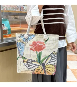 Canvas schoudertas met geweven vlinder en bloemen patroon, grote capaciteit tote tas.