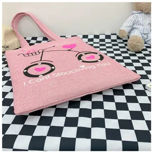 Borsa a tracolla in tela di lino rosa con stampa bici e cuori, stile casual grazioso.