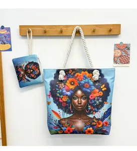 Grand sac cabas en toile avec imprimé artistique de femme noire florale et pochette assortie.
