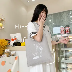 Borsa tote in tela grigia con simpatico stampa cartoon, elegante borsa a tracolla per studenti.