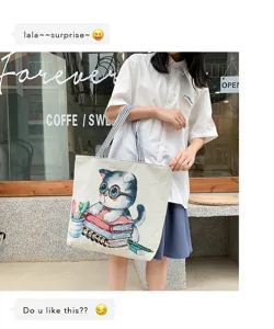 Cute cat canvas tote bag for women, casual shoulder shopping bag with book and glasses print.