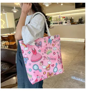 Pink canvas tote bag with cute princess prints and rope handles for women beach use.