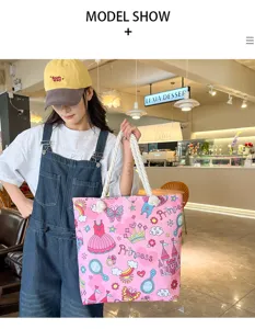 Stylish canvas tote bag for women with cute pink princess cartoon print and rope handles.
