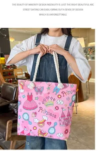 Pink canvas shoulder bag with cute cartoon prints and rope handles for women casual daily use