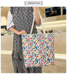 Floral canvas beach bag with thick rope handles, casual shoulder bag and large shopping tote.