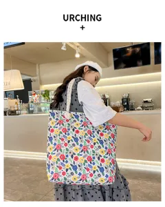 Floral canvas tote bag for women, stylish single shoulder beach bag with rope handle.