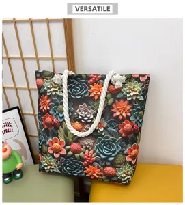 Vista dettagliata della borsa tote in tela floreale, grande borsa a spalla casual con manici.