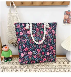 Casual floral canvas beach bag with thick rope handles, stylish women's tote shopping bag.