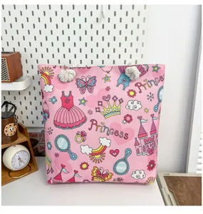 Detailed view of the pink canvas tote bag with cartoon princess prints and rope handles for daily use.