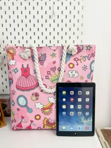 Pink canvas beach bag with rope handles and cute princess print for women fashion.