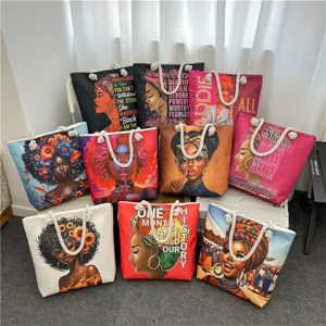 Canvas beach tote bag featuring artistic African woman prints and inspirational quotes with durable rope handles.