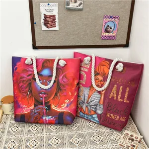 West African style canvas tote bag with rope handles, dual-sided art print beach handbag.