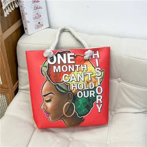 Large capacity canvas tote bag with artistic African woman graphic and motivational quote print.