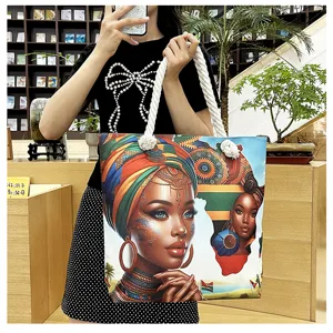 Leinwand Tragetasche Detail zeigt afrikanische Frauen Porträt Druck und dicke Seilgriffe.
