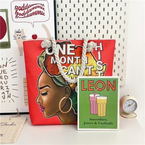 West African Rubina canvas tote bag with rope handles, double-sided art print beach bag.