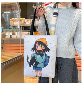 Vista dettagliata della borsa di tela casual con stampa di ragazza di cartone animato e gatto nero.