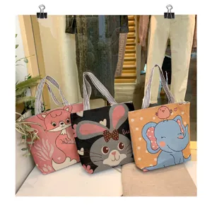 Borsa a tracolla in tela cartone animato grande capacità borsa ricamata carina studente