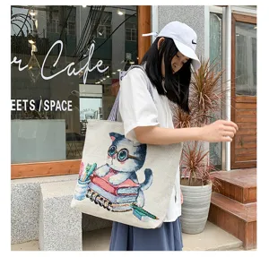 Korean style canvas shoulder bag for women, cute cat print casual tote shopping handbag.