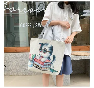 Korean style canvas shoulder bag for women, cute cat print casual tote shopping handbag.