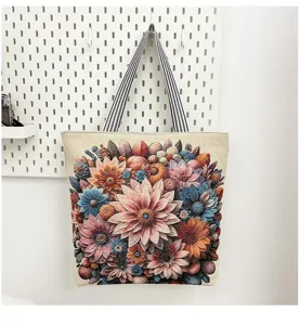Gedetailleerd uitzicht van een vintage bloemen jacquard canvas tote tas aan een wand.