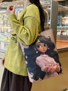 Canvas shoulder bag with stylish cartoon girl graphic large capacity casual tote for daily use