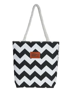 Schwarz-weiße Chevron-Segeltuchtasche mit dicken Seilgriffen und stilvollem Design für den Alltag